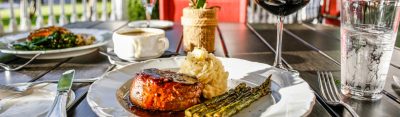 Steak, mashed potatoes, asparagus, and glass of red wine