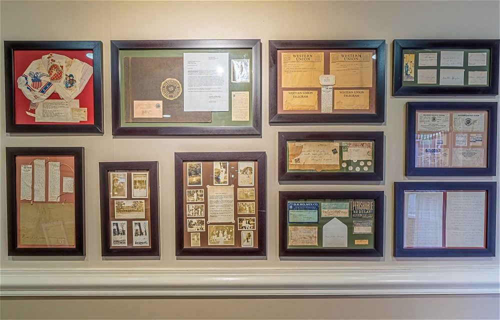 Wall of historic Abingdon artifacts at The Martha